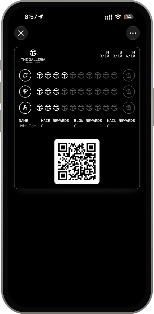 iPhone showing The Galleria Hair Beauty Lounge digital loyalty card in Apple Wallet, showing three stamp rows for hair treatments, blow dry and nail treatments, and a QR code to scan at reception